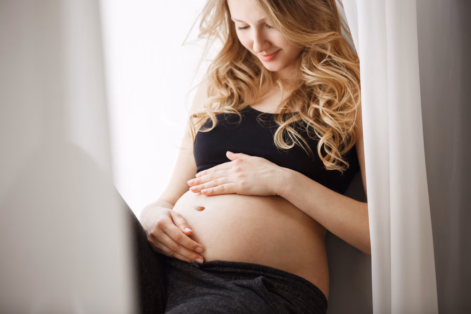 bébé appuie sur le col signe d'accouchement